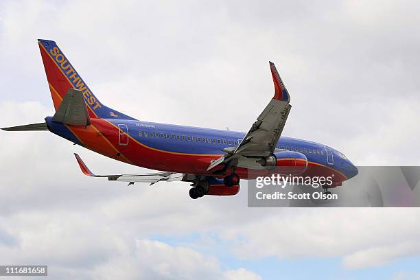 Southwest Airlines Boeing 737-3H4 passenger jet prepares to land at Midway Airport on April 5, 2011 in Chicago, Illinois. Southwest Airlines said it...