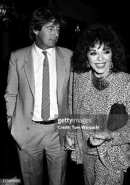 Bill Wiggins and Joan Collins during Joan Collins Sighting at Annabel's Club - 1987 at Annabel's Club in London, Great Britain.