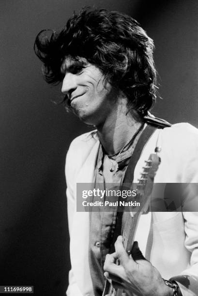Guitarist Keith Richards of the Rolling Stones with his band the New Barbarians performs at the International Amphitheatre on April 28, 1979 in...