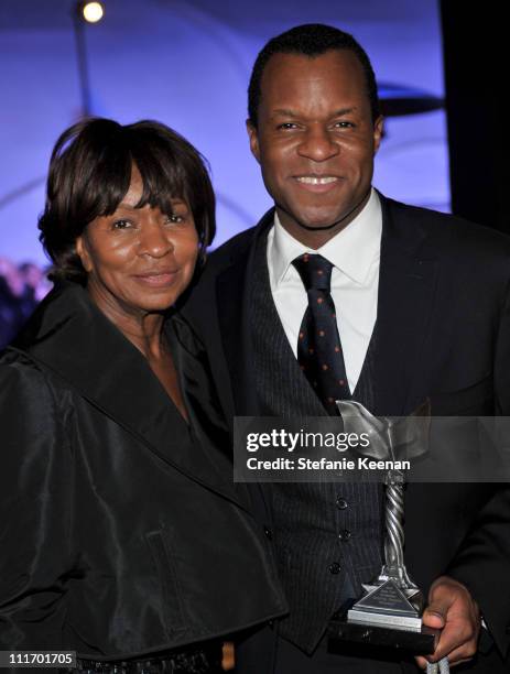 Screenwriter Geoffrey Fletcher and guest attend the ELLE Green Room at the 25th Film Independent Spirit Awards held at Nokia Theatre L.A. Live on...