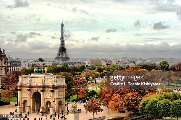autumn in paris - louvre stock-fotos und bilder
