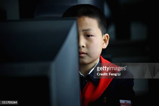 North Korean children learn to use the computer in a primary school on April 2, 2011 in Pyongyang, North Korea. Pyongyang is the capital city of...