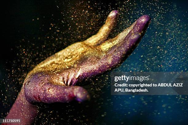 its all about catching the dreams... - holi hands stock pictures, royalty-free photos & images