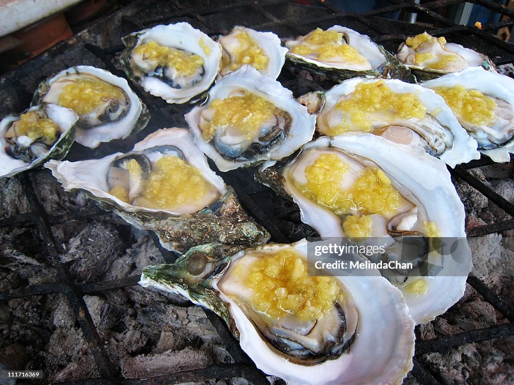 BBQ oysters with garlic sauce