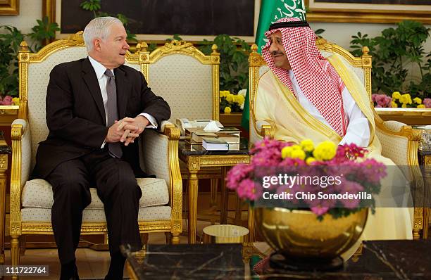 Defense Secretary Robert Gates talks with Saudi Assistant Minister of Defense and Aviation Prince Khalid bin Sultan during a coffee ceremony after...