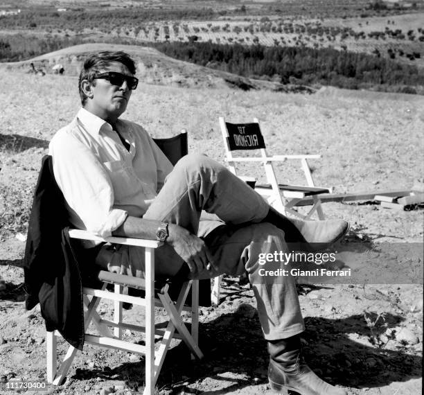 Robert Mitchum during a break from filming the movie 'Villa Rides', near Madrid, directed by Buzz Kulik Madrid, Spain. .