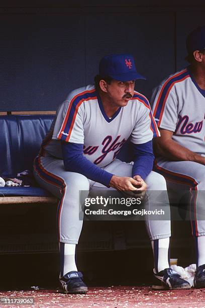 Manager Davey Johnson of the New York Mets sits in the dugout during a game against the Pittsburgh Pirates at Three Rivers Stadium in 1987 in...