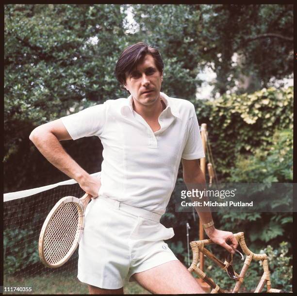 English singer-songwriter Bryan Ferry of Roxy Music, in tennis gear at his home in London, 16th July 1976. (Photo by Michael Putland/Getty