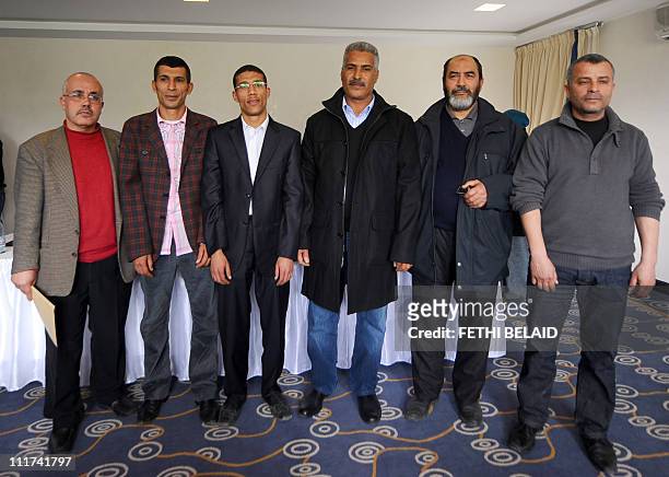 The leadership of the new Tunisian Islamist Ettahrir Party poses after a press conference on March 10, 2011 in Tunis. From left: spokesman Ridha...