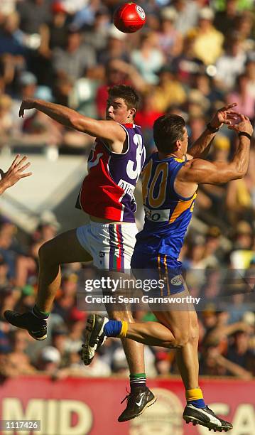 Leigh Brown for Fremantle and Troy Wilson for West Coast in action during the round 1 AFL football match between the West Coast Eagles and Fremantle...