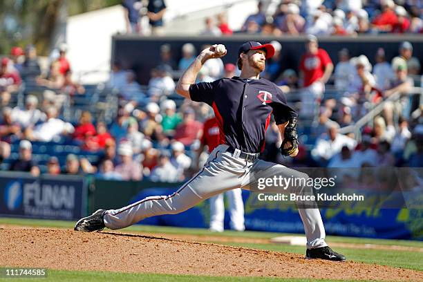 Jim Hoey of the Minnesota Twins pitches to the Boston Red Sox at a Spring Training game February 28, 2011 at City of Palms Park in Fort Myers,...