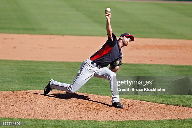 Jim Hoey of the Minnesota Twins pitches to the Boston Red Sox at a Spring Training game February 28, 2011 at City of Palms Park in Fort Myers,...