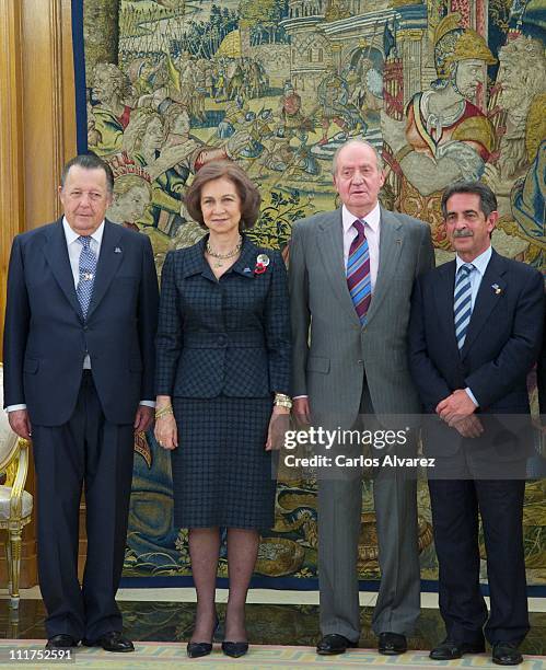 King Juan Carlos I of Spain and Queen Sofia of Spain receive Cantabria Regional President Miguel Angel Revilla and Carlos de Borbon, members of...