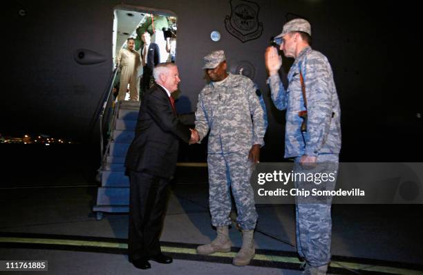 Defense Secretary Robert Gates is met U.S. Army General Lloyd Austin , commanding general of U.S. Forces in Iraq, after arriving April 6, 2011 in...