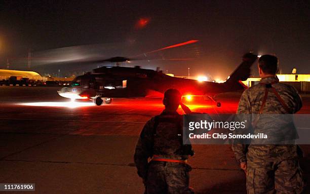 Blackhawk helicopter with U.S. Defense Secretary Robert Gates and U.S. Army Gen. Lloyd Austin, commanding general of U.S. Forces in Iraq, on board...