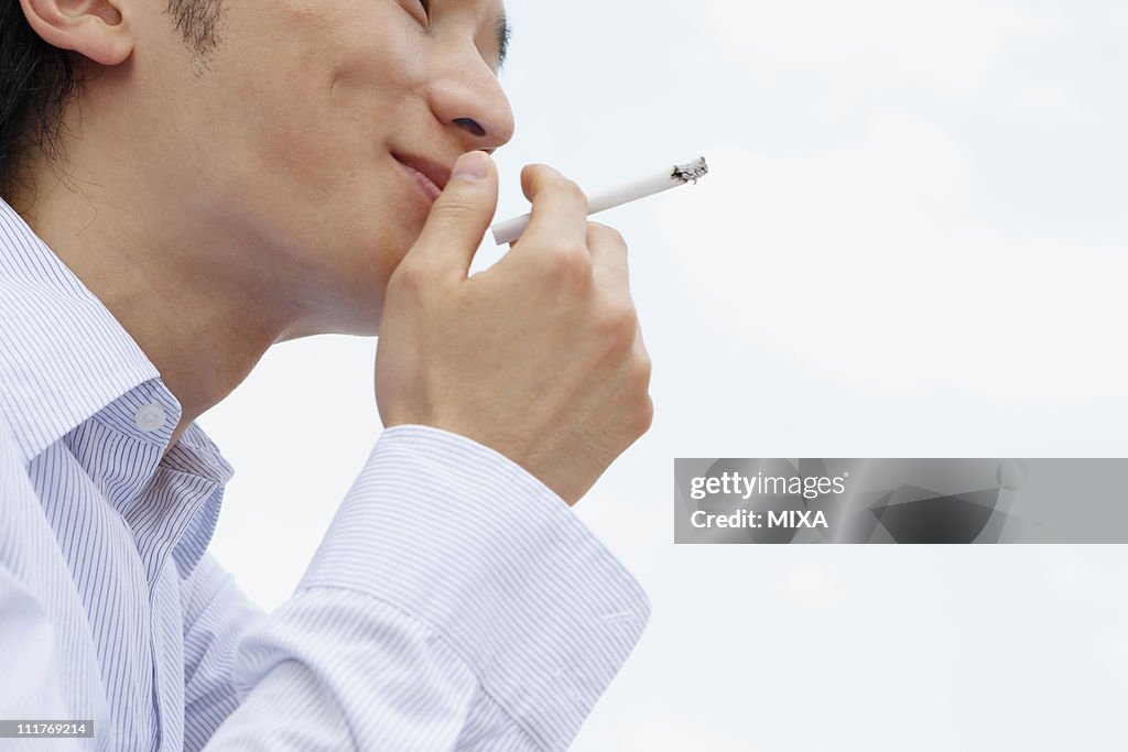 Mid Adult Man Smoking