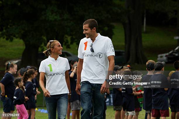 Laureus World Sports Academy Ambassador's and Olympic triathlon champions Emma Snowsill and Jan Frodeno are joined by Indigenous school children,...