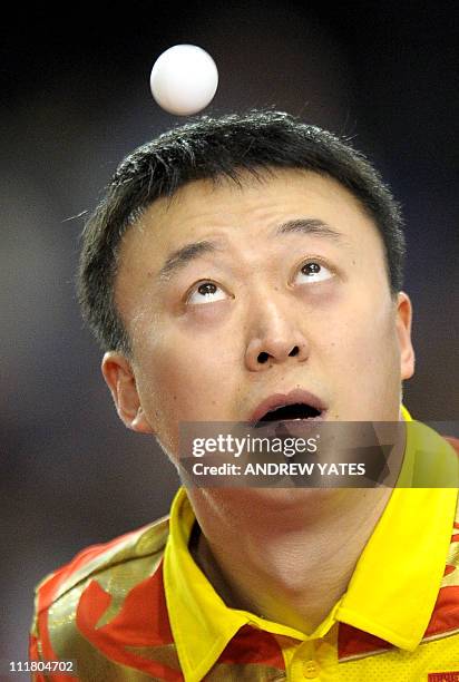Lin Ma of China serves to Dominik Habesohn of Austria during the English Open Table Tennis competition in Sheffield, on January 28, 2011. AFP...