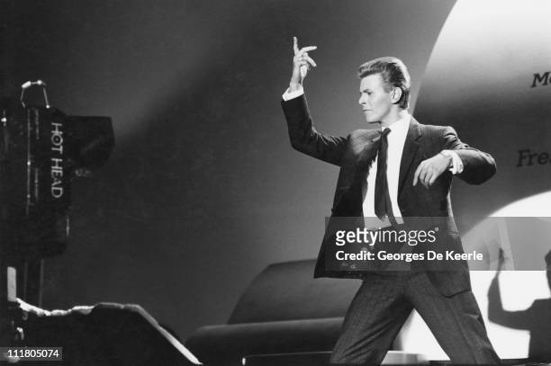 English singer and actor David Bowie films a scene for the film 'Absolute Beginners', directed by Julien Temple, UK, May 1985.