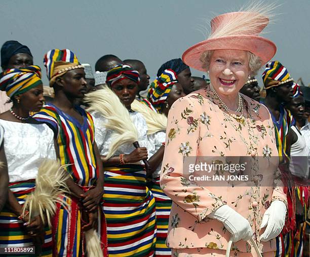 Queen Elizabeth II tours 04 December 2003 the secretariat of Karu Local council, near Abuja. After a tree-planting ceremony earlier today in Abuja,...