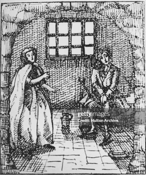 English pirate John Rackham, aka Calico Jack is visited by crew member Mary Read whilst in prison in Jamaica, awaiting his execution, November 1720....