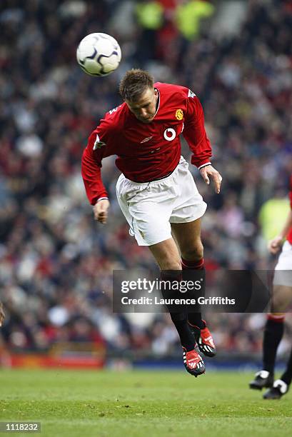 David Beckham of Manchester United heads the ball during the FA Barclaycard Premiership match between Manchester United and Middlesbrough played at...