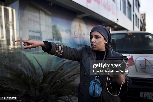 Director Roya Sadaat and the cast and crew of the television show "Beheshte Khamosh," film a scene in Kabul, Afghanistan December 2, 2010. The film...