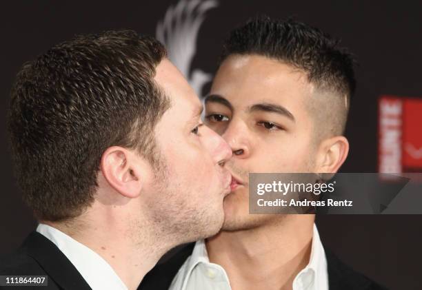 Marco Kreuzpaintner kisses his partner Gilardi at the 'new faces award' 2011 at the bcc on April 7, 2011 in Berlin, Germany.