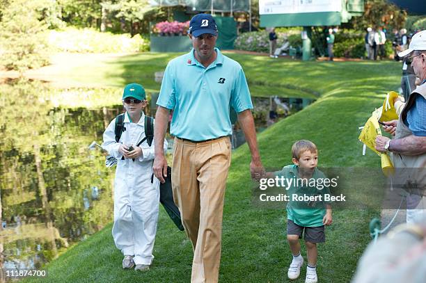 Masters Preview: Matt Kuchar walking with his sons Cameron and Carson during Par 3 Contest on Wednesday at Augusta National. Augusta, GA...