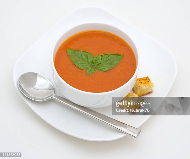 tomato soup in a bowl - elegant spoon stock pictures, royalty-free photos & images