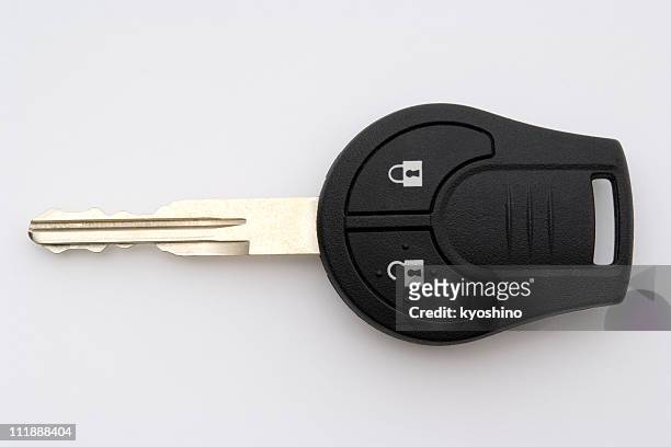 isolated shot of new car key on white background - car keys on white stock pictures, royalty-free photos & images