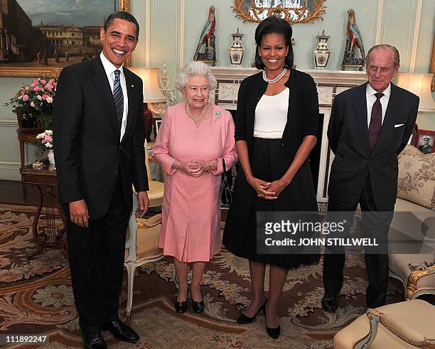 President Barack Obama and his wife Michelle meet with Britain's Queen Elizabeth II and Prince Philip, the Duke of Edinburgh during an audience at...