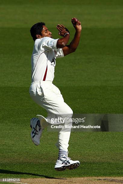 Chaminda Vaas of Northants bowls during the first day of the LV= County Championship Division 2 match between Surrey and Northants at The Kia Oval on...