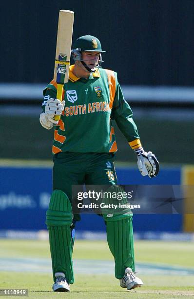 Graeme Smith of South Africa raises his bat after reaching his 50 during the South Africa v Australia One Day International played at Port Elizabeth,...