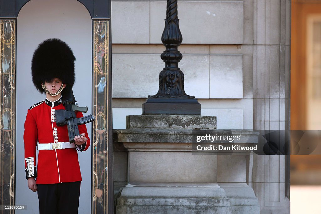 Visitors To London Watch The Changing The Guard At Buckingham Palace