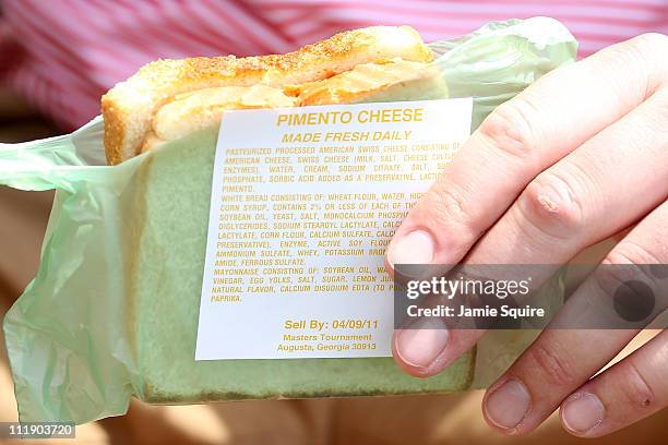 One of Augusta National's famed pimento cheese sandwiches is seen during the second round of the 2011 Masters Tournament at Augusta National Golf...