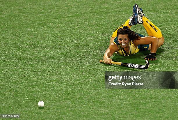 Kellie White of Australia dives for a shot during game three of the International Test Series between the Australian Hockeyroos and Argentina at...