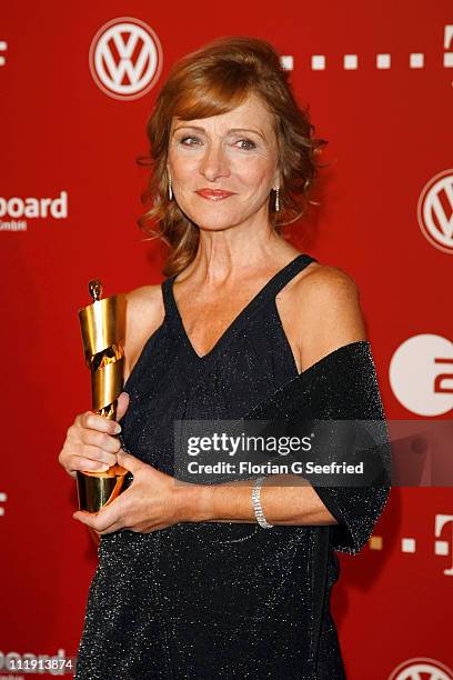 Beatriz Spelzini poses with her award for Best Supporting Actress during the 'Lola - German Film Award 2011' at Friedrichstadtpalast on April 8, 2011...