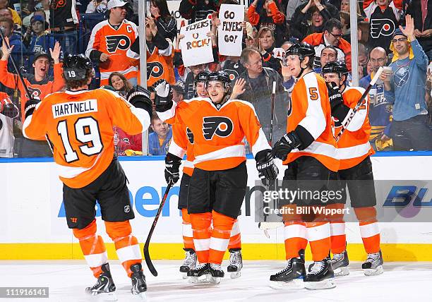 Danny Brier of the Philadelphia Flyers celebrates a second period goal with Scott Hartnell during a game against the Buffalo Sabres at HSBC Arena on...