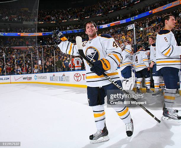 Nathan Gerbe of the Buffalo Sabres celebrates an overtime win against the Philadelphia Flyers at HSBC Arena on March 8, 2011 in Buffalo, New York,...