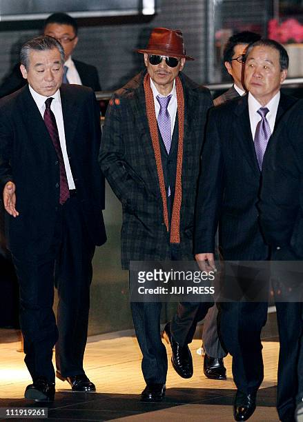Kenichi Shinoda , the boss of Japan's largest "yakuza" gang, the Yamaguchi-gumi, walks at Tokyo's Shinagawa station to return to his his home in...
