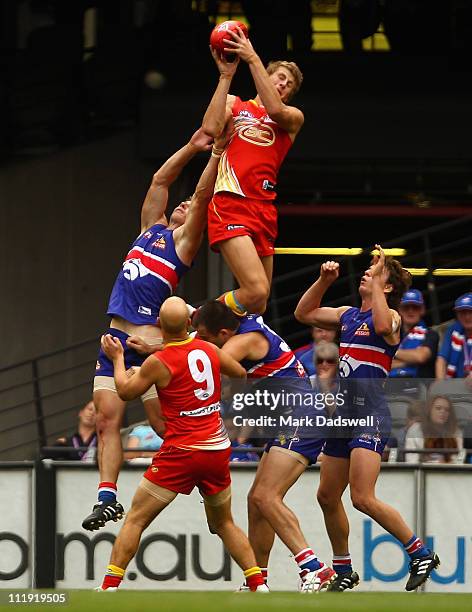 Daniel Gorringe of the Suns marks during the round three AFL match between the Western Bulldogs and the Gold Coast Suns at Etihad Stadium on April 9,...