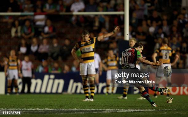 Nick Evans of Harlequins kicks the conversion during the Amlin Challenge Cup quarter final match between Harlequins and London Wasps at The Stoop on...