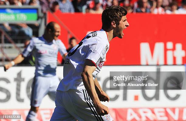 Thomas Mueller of Bayern Muenchen celebrates his first goal during the Bundesliga match between 1. FC Nuernberg and FC Bayern Muenchen at Easy Credit...