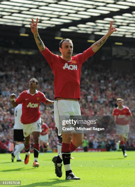 Dimitar Berbatov of Manchester United celebrates scoring the opening goal during the Barclays Premier League match between Manchester United and...