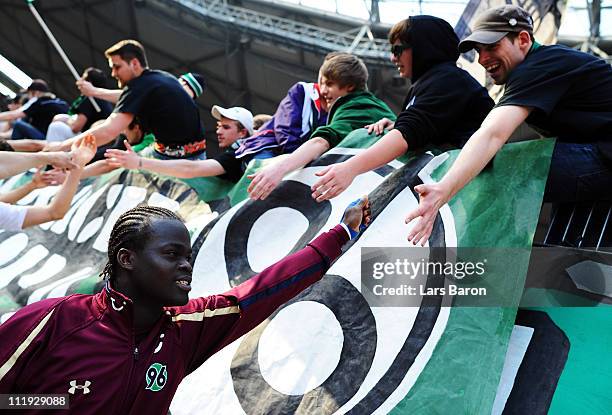 Didier Ya Konan of Hannover celebrates with the fans after winning during the Bundesliga match between Hannover 96 and FSV Mainz 05 at AWD Arena on...