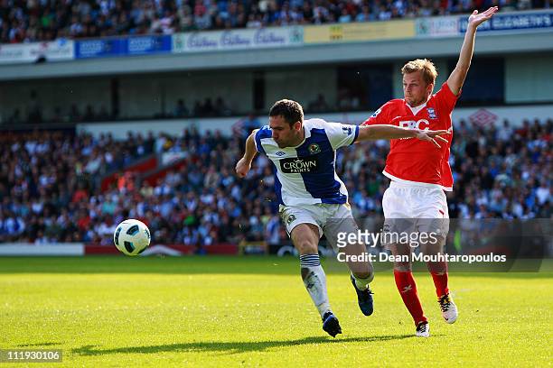 David Dunn of Blackburn holds back Sebastian Larsson of Birmingham City during the Barclays Premier League match between Blackburn Rovers and...