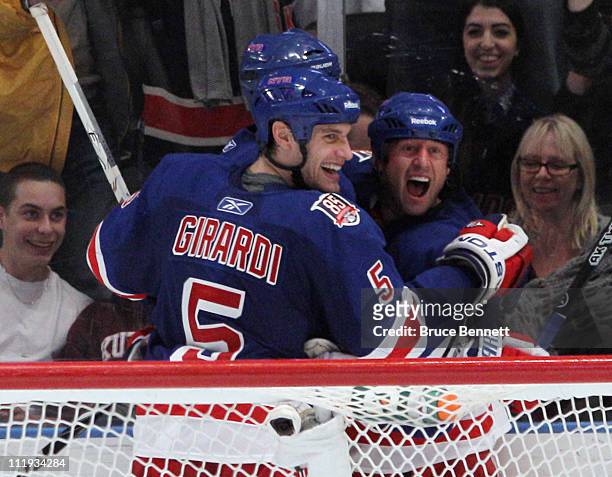 Dan Girardi and Vaclav Prospal of the New York Rangers celebrate Prospal's goal at 10:49 of the third period against the New Jersey Devils at Madison...