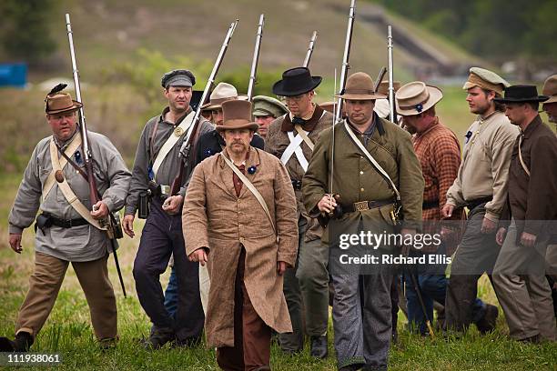 Confederate re-enactors march during a demonstration April 9, 2011 at Fort Moultrie in Charleston, South Carolina. The 150th anniversary of the first...