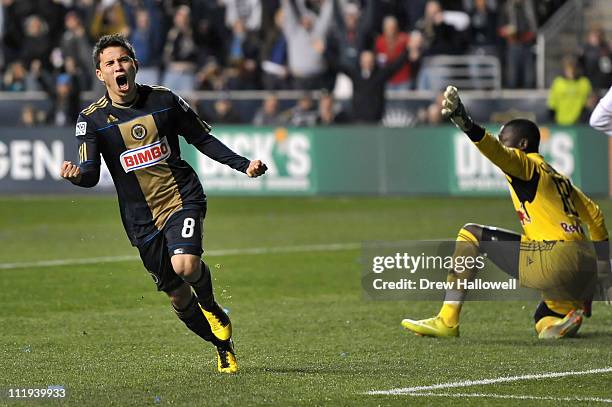 Roger Torres of the Philadelphia Union celebrates his game winning goal past goalkeeper Bouna Coundoul of the New York Red Bulls at PPL Park on April...